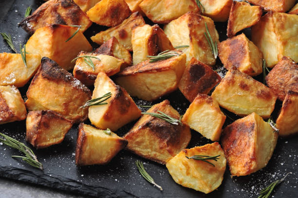 istock Baked potato slices. Potatoes in a rustic style. 1281440162