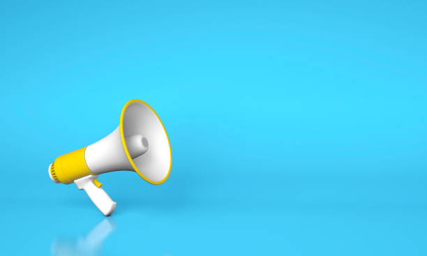 istock Yellow megaphone loudspeaker on a blue background. Copy space for text. 3d render 1281441441