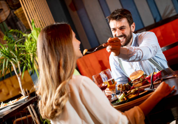 istock Young couple having dinner in the restaurant 1281442910
