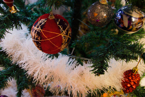istock Decorated Christmas tree on blurred background, christmas lights and handmade balls 1281443441