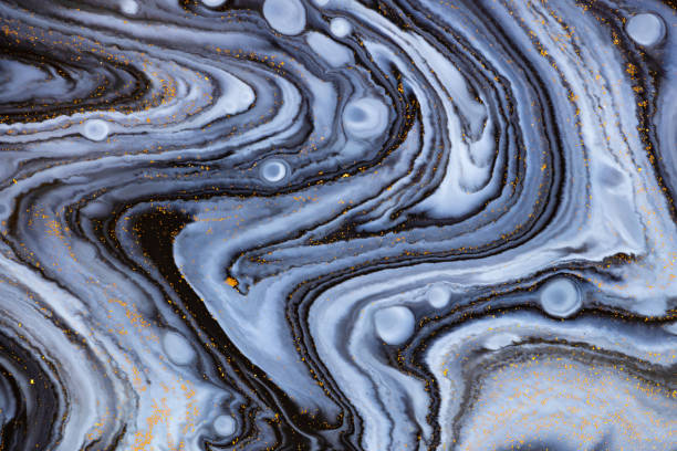 istock Fluid art texture. Background with abstract swirling paint effect. Liquid acrylic picture with flows and splashes. Mixed paints for website background. Blue, white and black overflowing colors. 1281444811