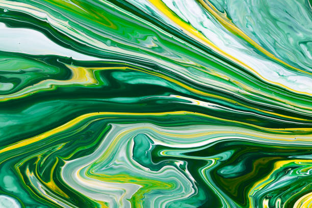 istock Fluid art texture. Background with abstract iridescent paint effect. Liquid acrylic picture with flows and splashes. Mixed paints for interior poster. Emerald, blue and yellow overflowing colors. 1281444822