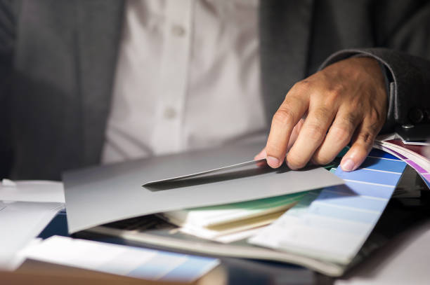 istock Business man measuring paper with color chart 1281446786