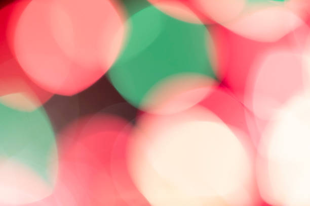 Colorfull background of tiny unsharp lights on a christmas tree