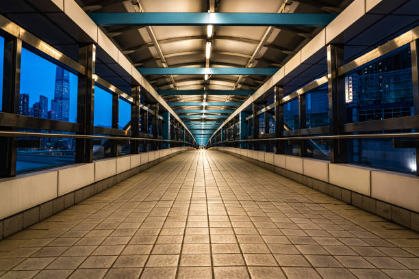 istock Modern empty foot bridge in the street. Building abstract background 1281448463