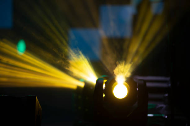 istock Yellow light of concert spotlights.Beautiful stage background with rays. 1281449680