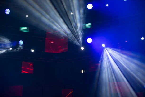 istock Stage spotlights background light.Concert lighting on a dark background. 1281449695