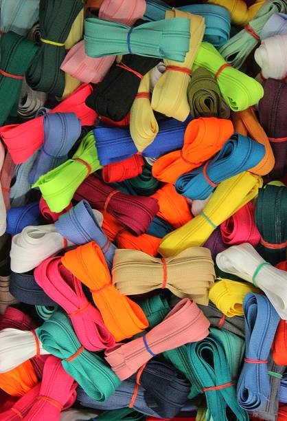 istock Detailed close up view on samples of cloth and fabrics in different colors found at a fabrics market 1281449965
