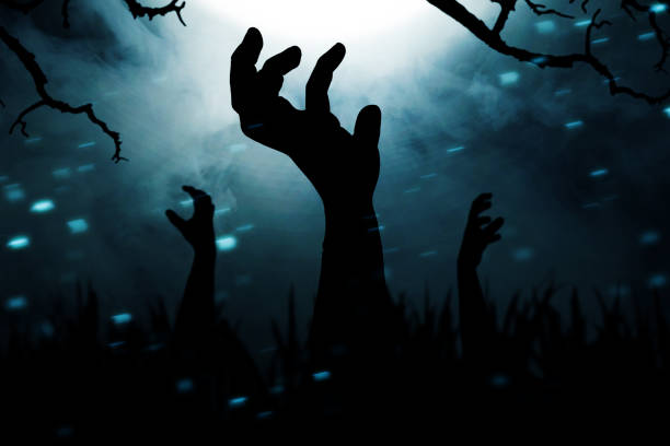 istock Silhouette of zombie hand 1281451314