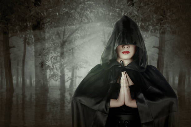 istock Asian witch woman with a cloak standing 1281453441