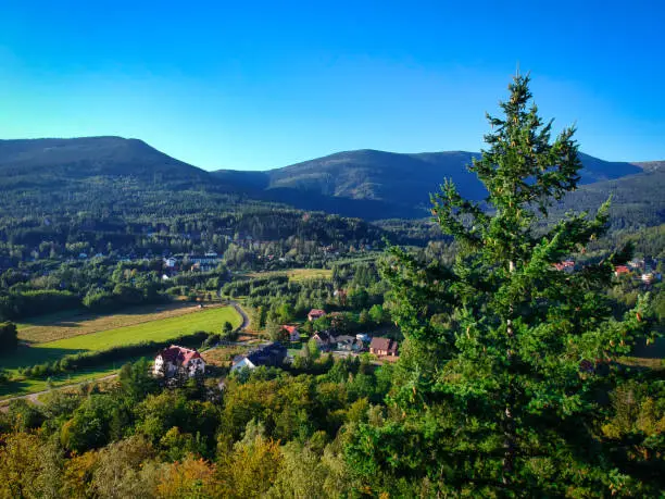 Aerial view of Karpacz city and the Karkonosze Mountains at summer, Poland