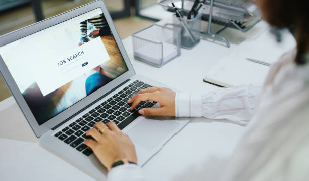 A new career is on it's way Shot of an unrecognisable businesswoman using a laptop to search for job vacancies applying stock pictures, royalty-free photos & images