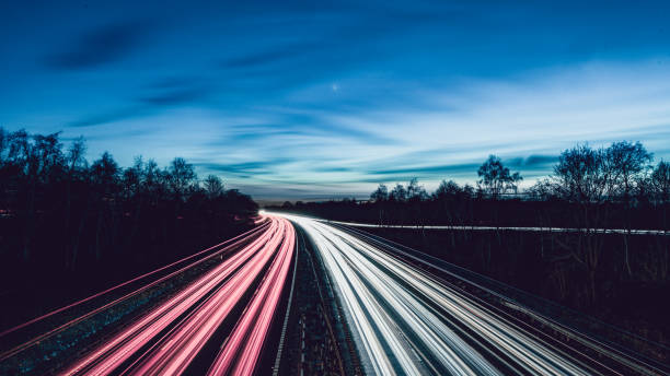 istock Sunset/Twilight sky over long exposure 3 lane motorway 1281455444