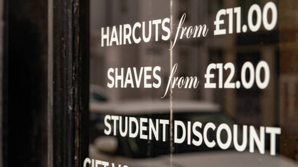 istock Barbers shop window with information and prices 1281455622