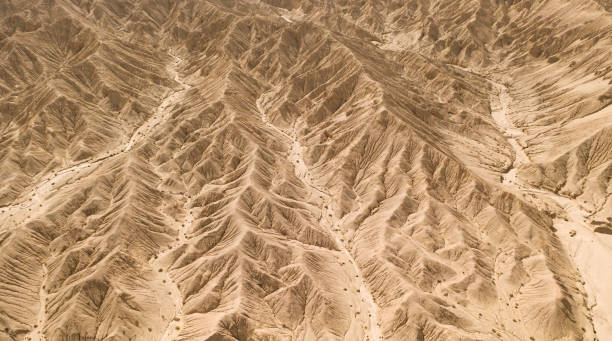 istock Dryness land with erosion terrain, geomorphology background. 1281456252