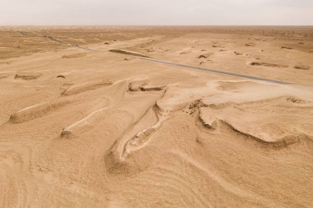 istock Dryness land with erosion terrain, geomorphology background. 1281456311