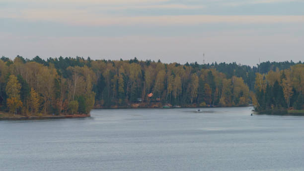 istock Golden autumn. Cloudy sunset over the river 1281456992