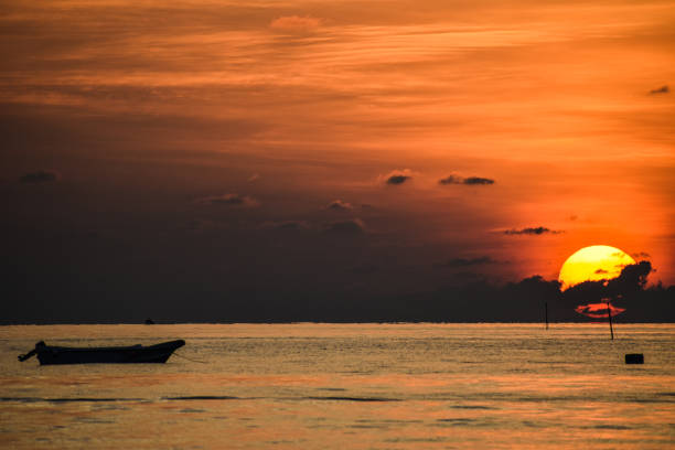 istock Beautiful sunset by the sea 1281458203