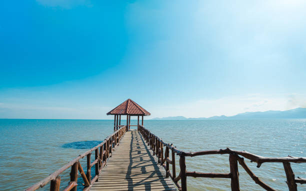 istock Front view of the iron pavilion in the sea. 1281462974