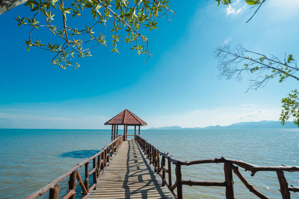 istock Front view of the iron pavilion in the sea. 1281462998