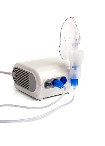 Inhaler. Nebulizer, medical equipment on white background.