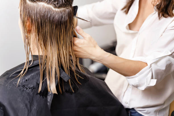 istock hair cutting process in a beauty salon 1281466261