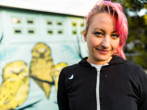 istock Female mural artist at work 1281466452