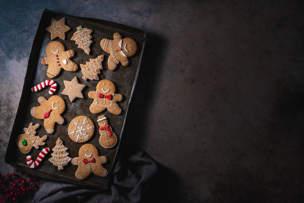 istock Christmas gingerbread man cookies on vintage baking tray 1281466645