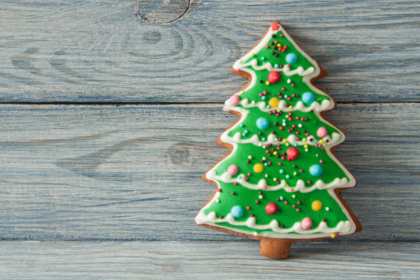 istock Christmas gingerbread on a wooden background 1281467588
