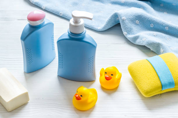 istock Newborn bath time concept with care cosmetics product 1281470828