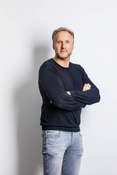 istock Portrait of a handsome caucasian man in posed studio shot 1281470854