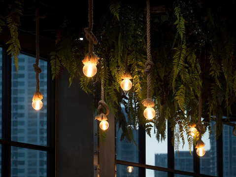 Light bulbs hanging from the ceiling.