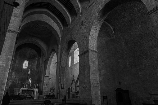 The church of San Pietro is a Catholic place of worship in Assisi, in the square of the same name, where an ancient Roman necropolis once stood. u built by the Benedictines in the 10th century, the church has been remodeled several times until the final reconstruction which dates back to the 13th century. The façade made of red stone from Mount Subasio has a rectangular shape. Originally, the façade culminated in a tympanum which was demolished after the earthquake of 1832. With three entrance portals which correspond, in the second band, to three rose windows . The two bands of the facade are divided between them by a cornice with hanging arches. The central portal is flanked by two roaring lions. The interior of the church, which was restored in 1954, has three naves separated by pillars, with the raised presbytery, semicircular apse and dome. There are six tombs from the 14th-15th century and the remains of frescoes from the same period. Under the main altar there is the sarcophagus with the body of St. Victorin the martyr, the third bishop of Assisi and co-protector of the city. Interesting is the chapel of the Blessed Sacrament, in Gothic style, with a precious triptych with a Madonna and Child between Saints Peter and Victorino, made between 1468 and 1475 by Matteo da Gualdo, also you can admire an Annunciation, at on the right a Madonna Enthroned and on the right wall San Vittorino.