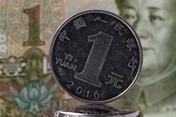 istock One yuan coin and bill 1281475420