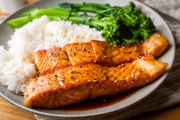 istock salmon teriyaki with rice and boiled broccolini 1281477314
