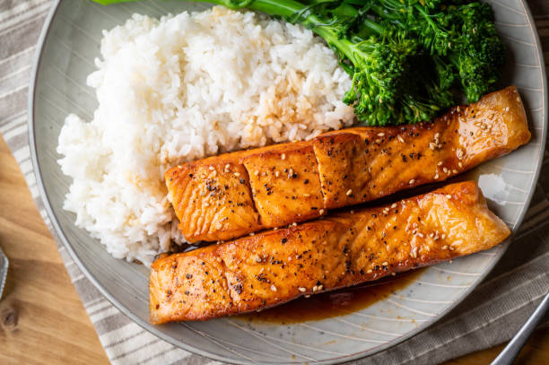 istock salmon teriyaki with rice and boiled broccolini 1281477350