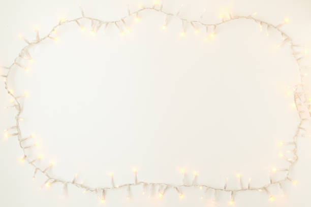 istock flat lay with Christmas lights on white 1281478382