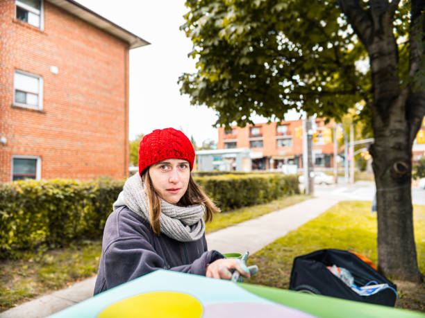 istock Female mural artist at work 1281478734