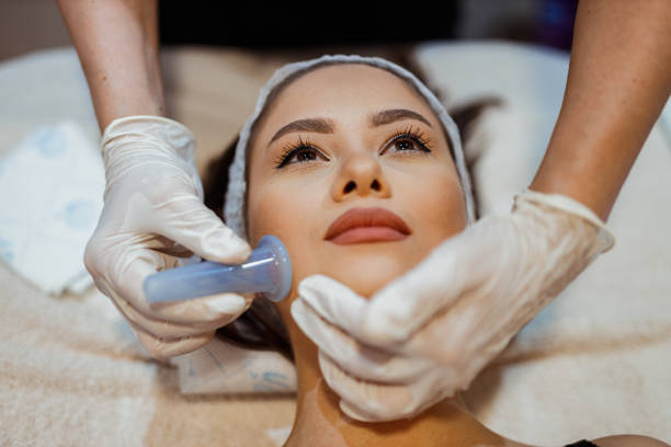istock Young woman having a relaxing face massage 1281479706