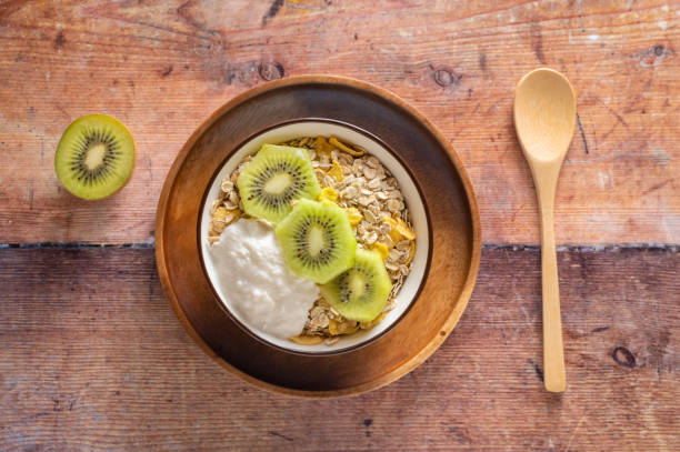 istock Granola bowl with kiwi and greek yogurt, top view 1281479914