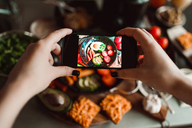 istock Photographing with a smart phone tasty fried egg breakfast 1281481667