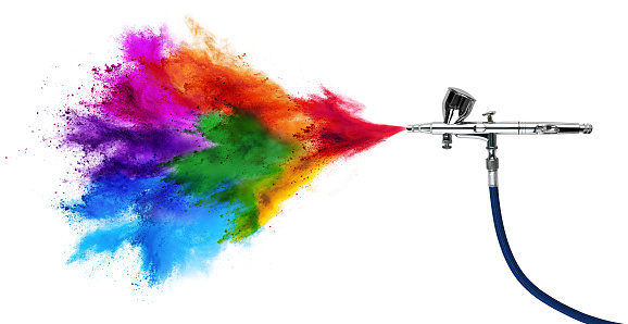 professional chrome metal airbrush acrylic color paint gun tool with colorful rainbow spray holi powder cloud explosion isolated on white panorama background. industry art scale model modelling concept