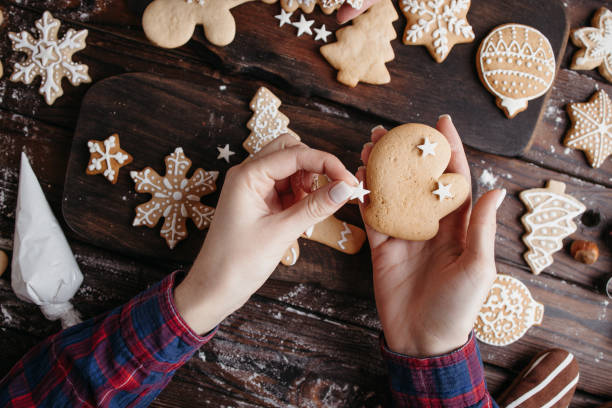 istock Decorating Christmas gingerbread cookies 1281487665