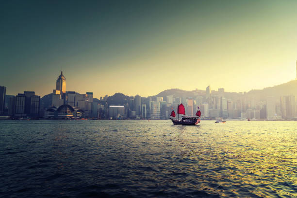 istock Hong Kong harbour in sunset time 1281489376