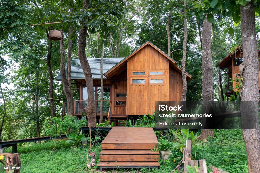Architecture wooden house in rainfoest Nan, Thailand - Aug 04 2018 : Architecture wooden house in tropical rainfoest Log Cabin Stock Photo