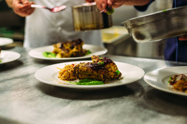 istock Meat dish with vegetables for catering. Lots of plates. 1281489889