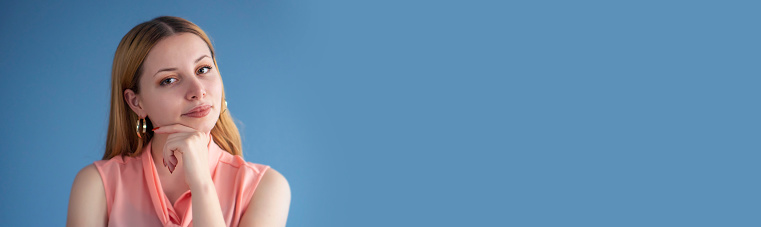 Beautiful business woman, Isolated on blue background banner.