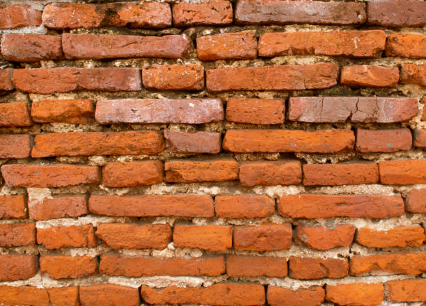 istock the textured background of a red brick wall. 1281491121