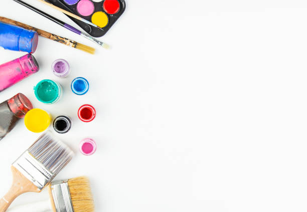 istock Artistic tools - brushes, watercolors on a white table. Banner. Copy space. 1281493602
