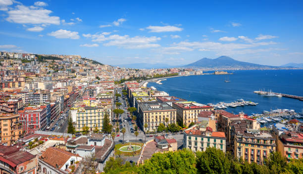 Panoramic view of Naples city and Mount Vesuvius, Italy Panoramic view of Naples city, Mount Vesuvius and gulf of Napoli, Mediterranean sea, Italy active volcano photos stock pictures, royalty-free photos & images